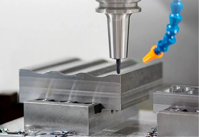 CNC milling machining process on metal part, showcasing precision cutting, high-accuracy tooling, and advanced manufacturing technology.