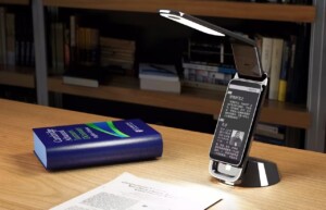 Injection molded plastic LED reading light with durable housing and precision design