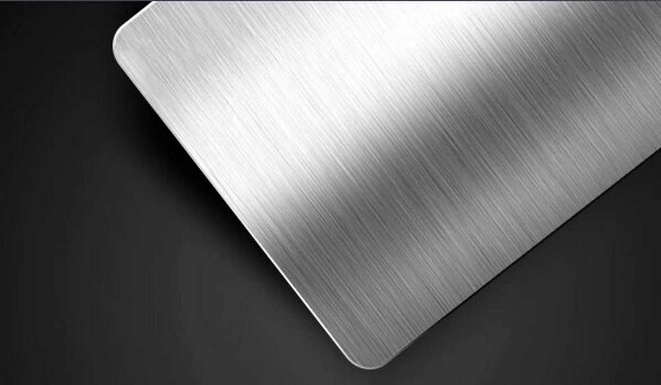 Brushing Surface Finish Brushing surface finish on metal parts creating a uniform texture and satin appearance.