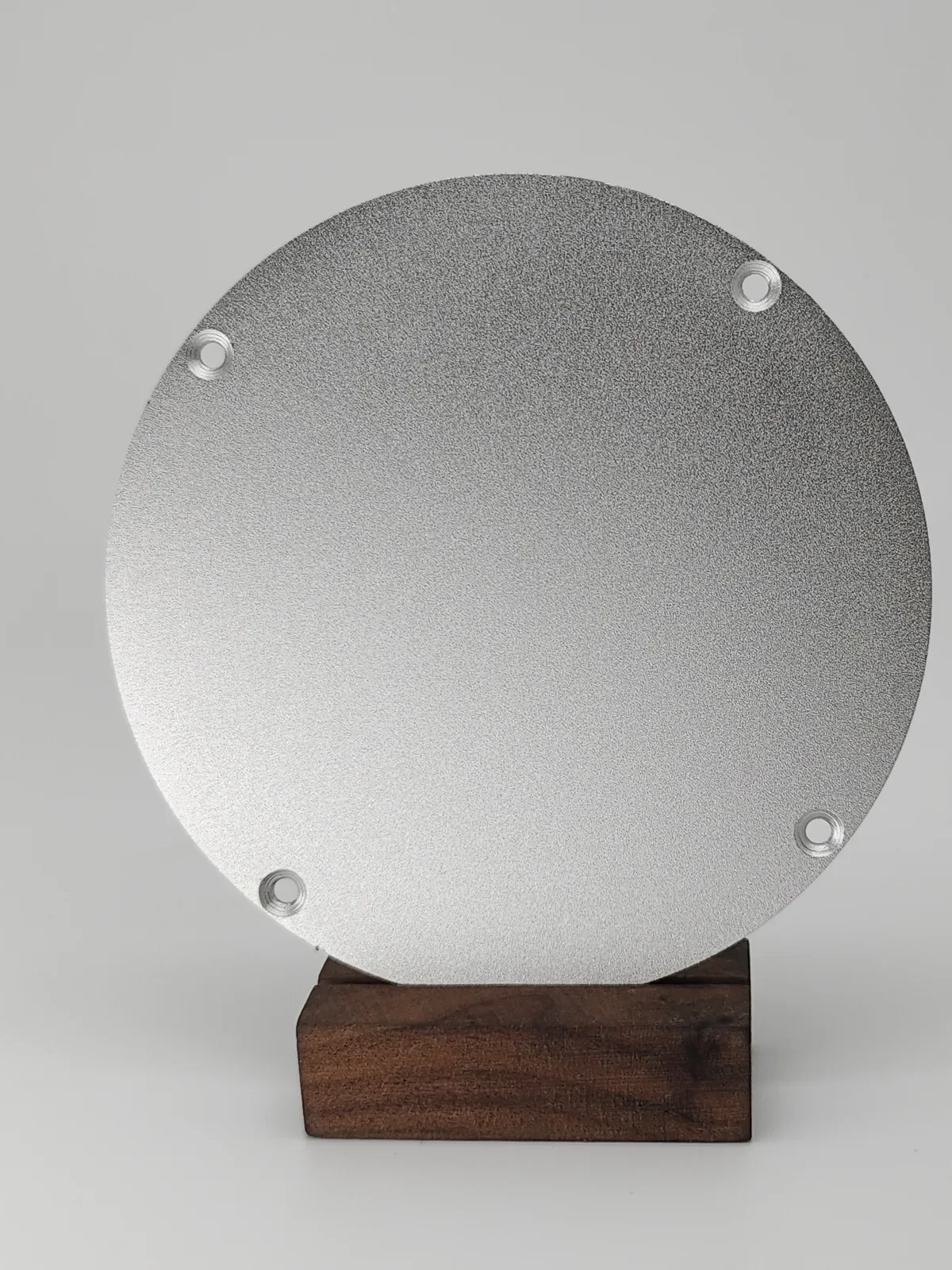 Sandblasting surface finish Sandblasted surface finish on metal part showing uniform matte texture and improved surface adhesion.